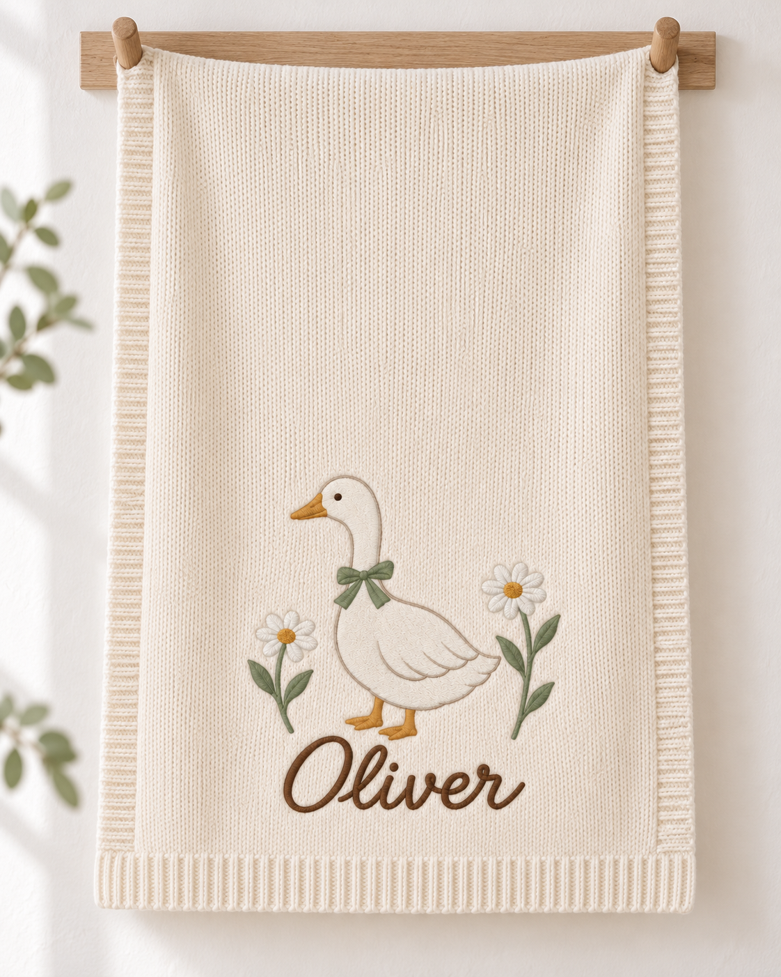 Goose & Daisies — digital styling preview with an example embroidered name
